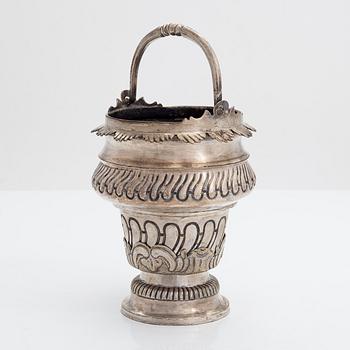 A silver plated brass Holy water bowl stamped L.G and dated 1774.