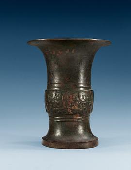 An archaic shaped bronze wine vessel, Tsun, in the style of Shang/early western Zhou style, presumably 17/18th Century.