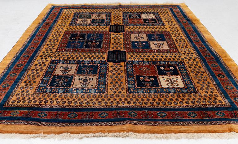 An oriental 'garden' carpet of Safavid design probably from the Shiraz area, Iran, c 343 x 254 cm.