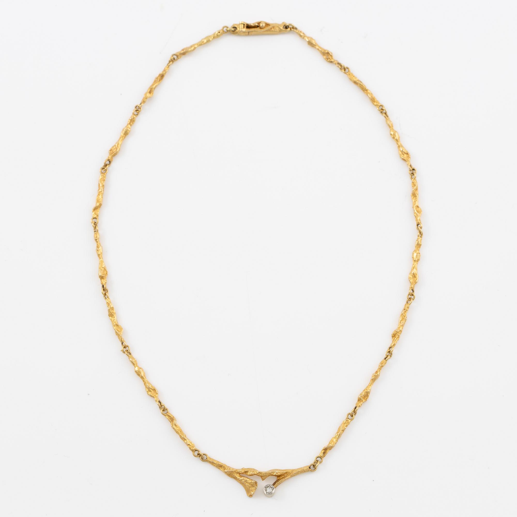 A Lapponia necklace, "Vårdagg", 18K gold with diamond.