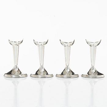 Guldsmedsaktiebolaget (GAB), Four Swedish silver candlesticks, mark of GAB, Stockholm 1961-68.