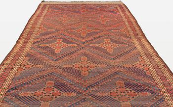 An antique Beshir carpet, ca 495 x 206 cm, around the year 1875.
