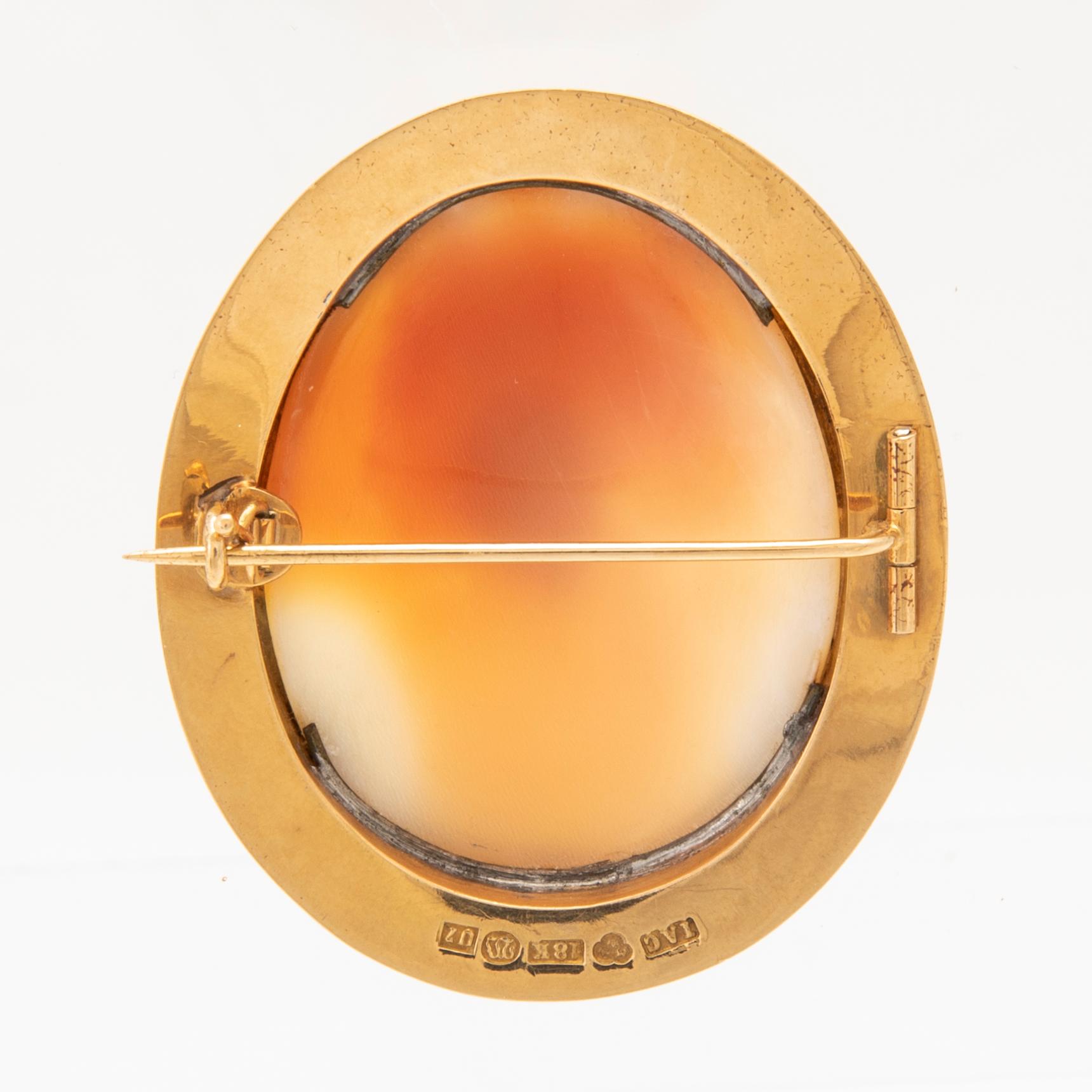 An 18K gold broosch with a carved shell cameo, Ivan Carlsson Vänersborg 1922.