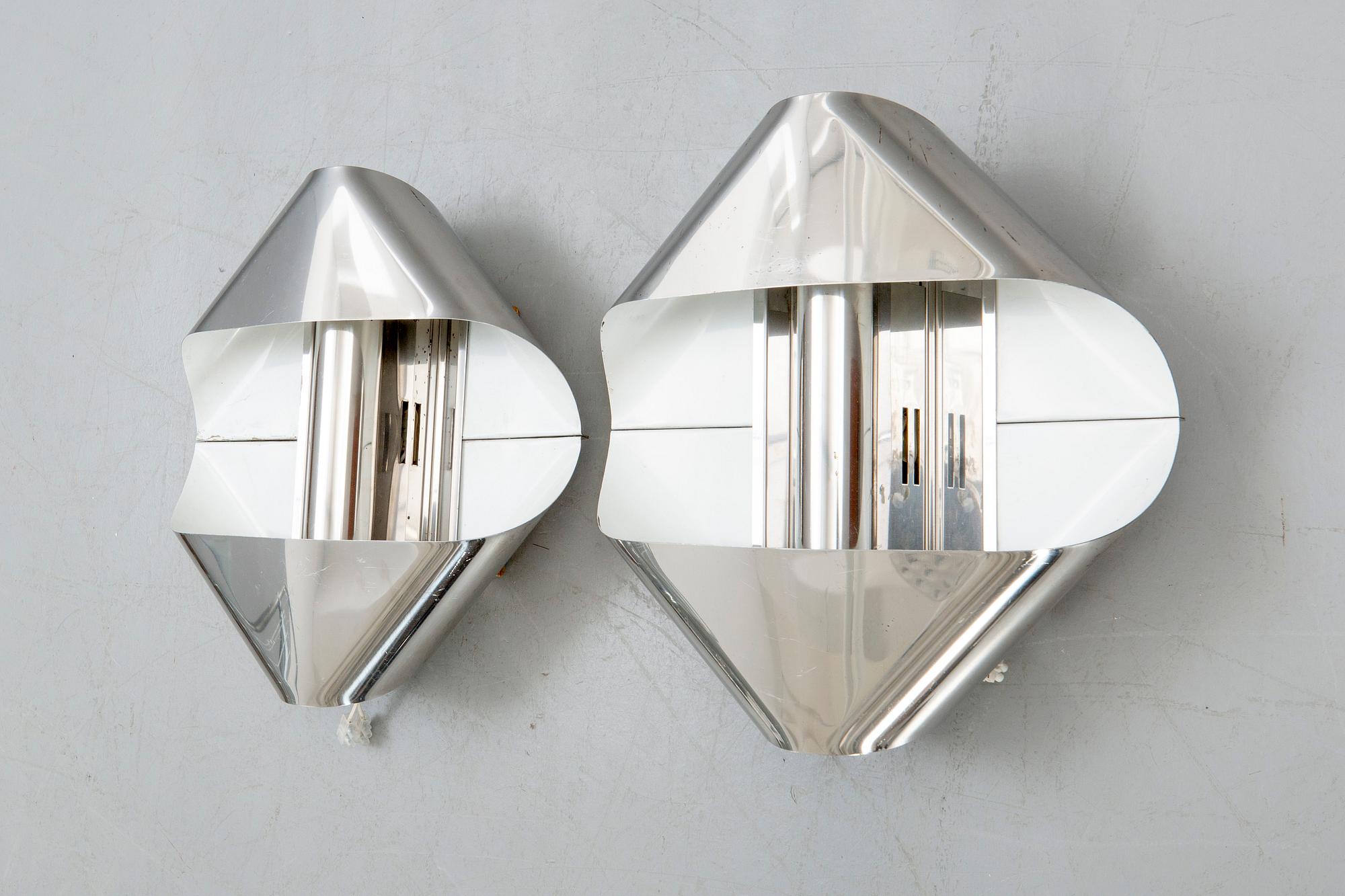 Wall lamps a pair of Guzzini Italy 1970s.