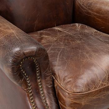 An armchair, contemporary.
