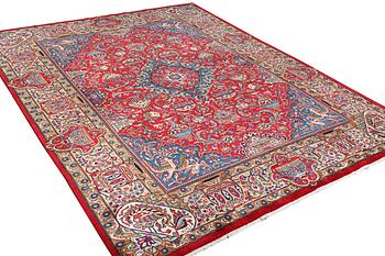 A Kashmar carpet, c. 390 x 298 cm.