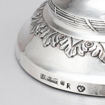 A pair of Swedish 18 century silver candelabras, mark of Lars Åkerblom Gävle 1775, arms by Christian Kullberg.