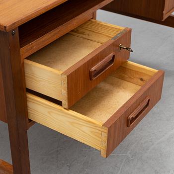 A 1960's teak writing desk.
