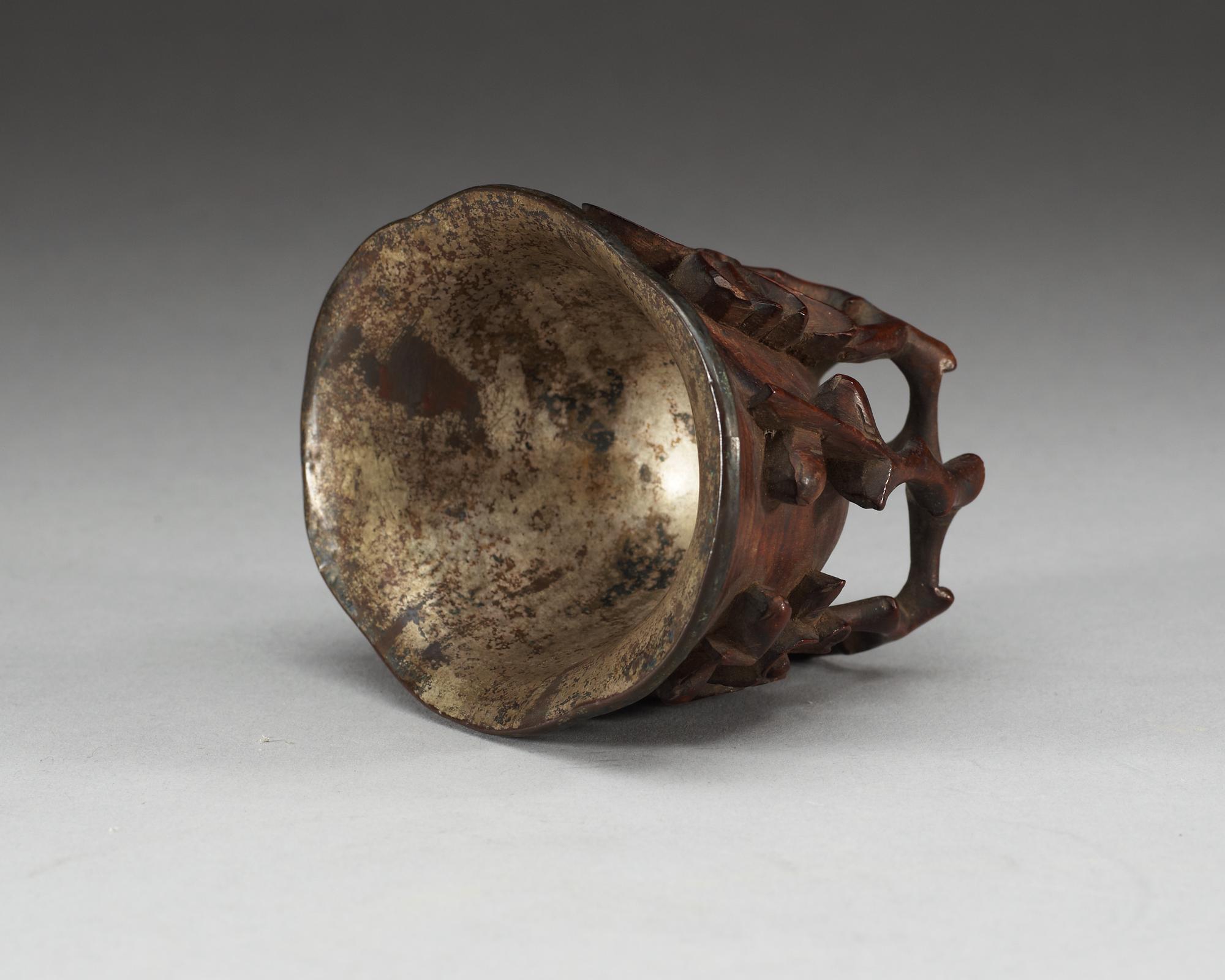 A carved bambu libation cup, Qing dynasty.