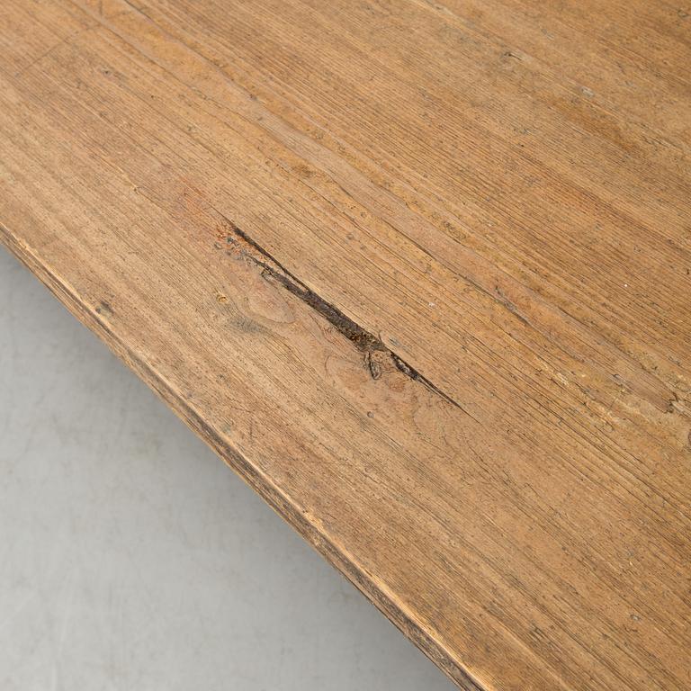 A 20th century pine table.