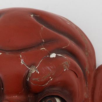 A Japanese masque, circa 1900.