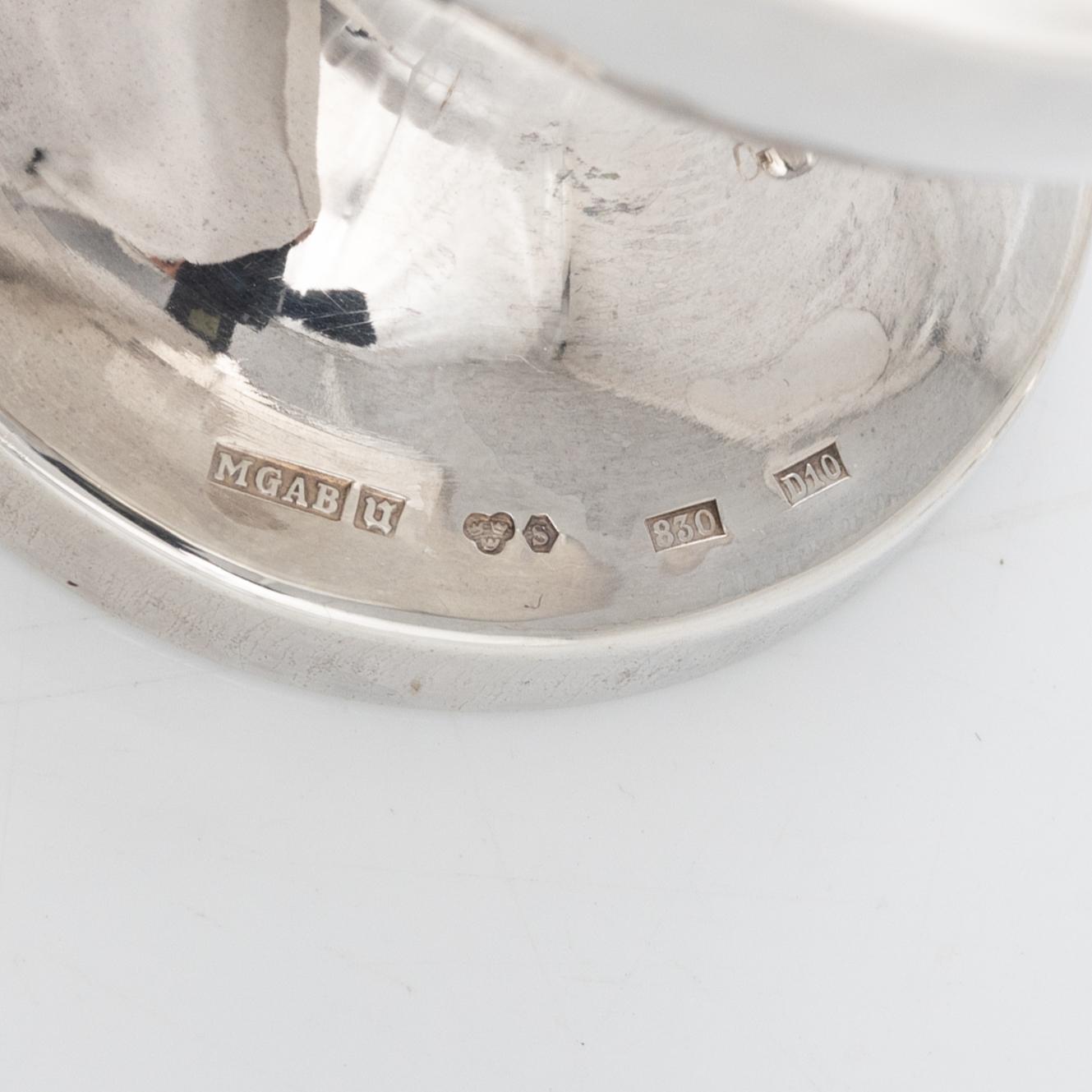 Punschmuggar, 7 st samt bägare, 10 st, silver, bl.a. Eric Löfman, MGAB, Uppsala, 1979.