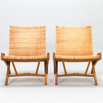 HANS J WEGNER, A pair of JH-512 folding chairs for Johannes Hansen, Denmark, early 1980s. Model designed in 1949.