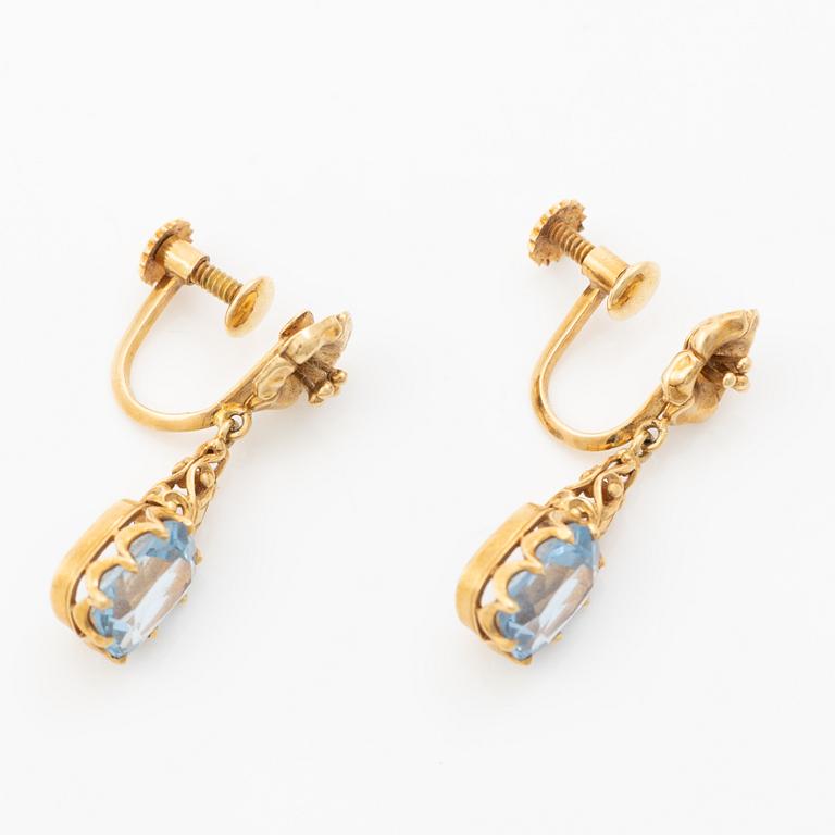 Earrings, 18K gold with synthetic blue spinels.