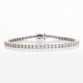 Tennis bracelet, 18K white gold, set with brilliant-cut diamonds.