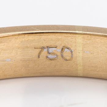 An 18K gold ring with diamonds ca. 0.39 ct in total.