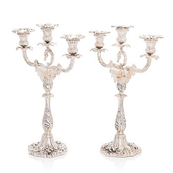 A pair of silver candelabra, maker's mark of Gustaf Möllenborg, Stockholm 1876.