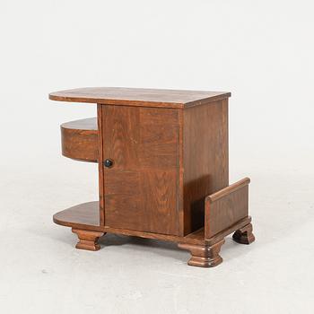 An Art Deco oak side table first half of the 20th century.