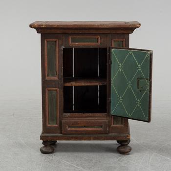 A painted cabinet, marked 1814.