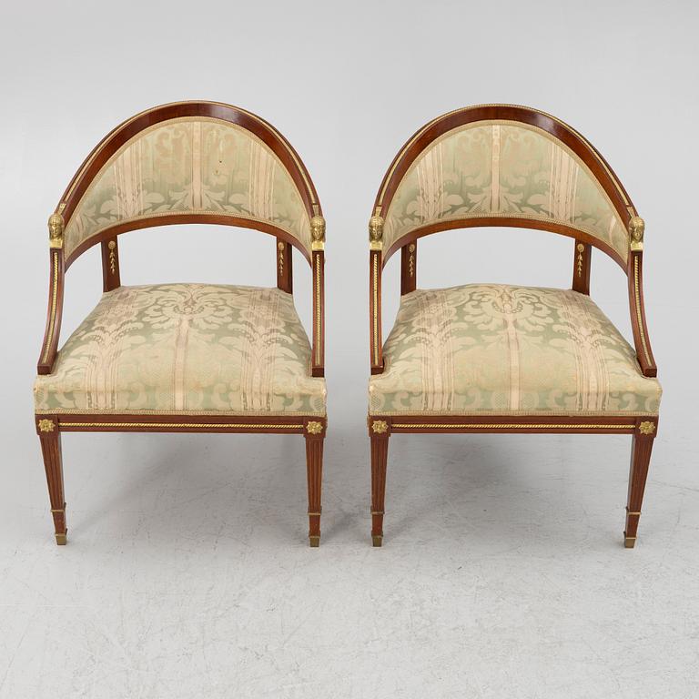 A sofa, two armchairs, four chairs and table, Empire style, 20th century.