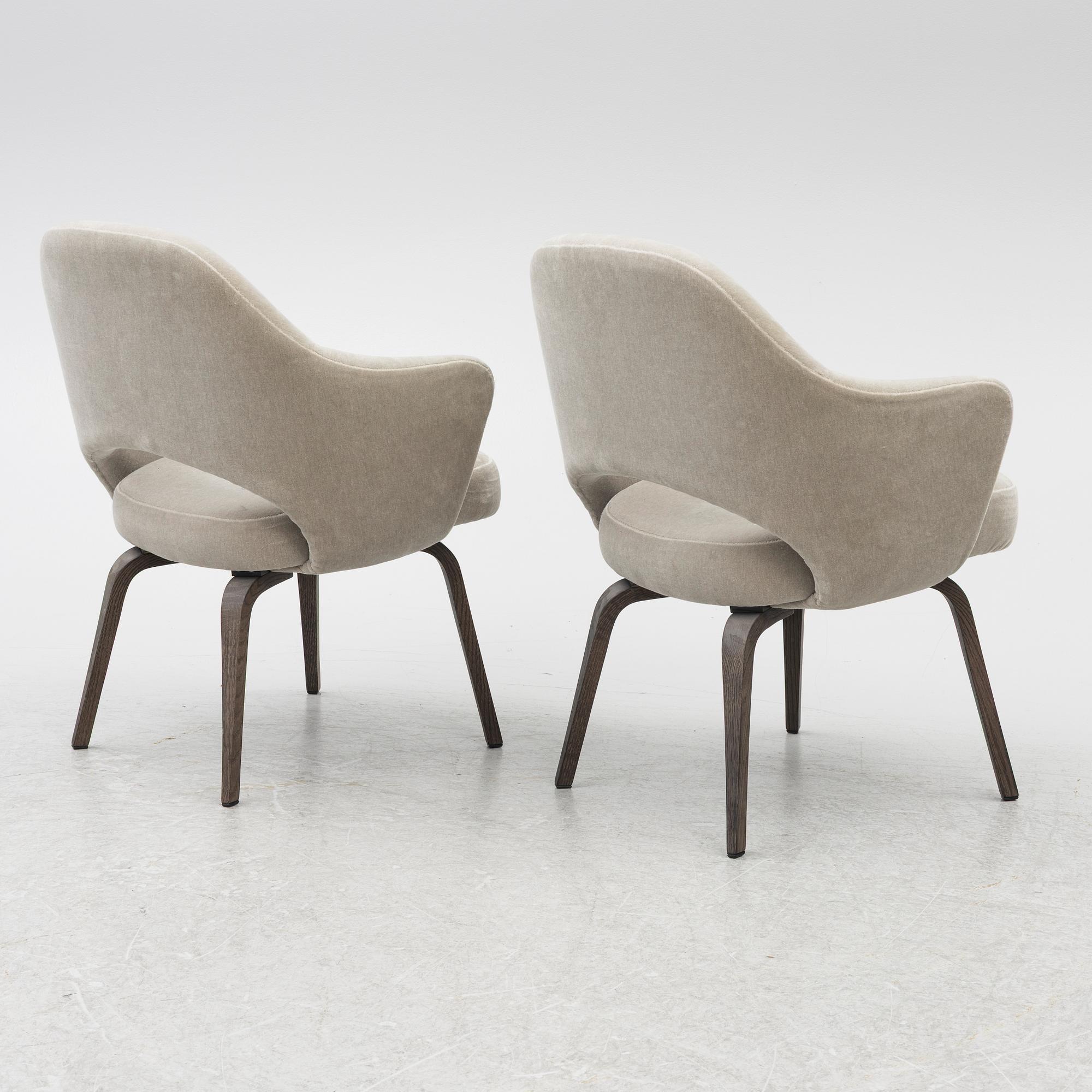 Eero Saarinen, chairs, a pair, "Executive Side Chair", Knoll, 21st century.