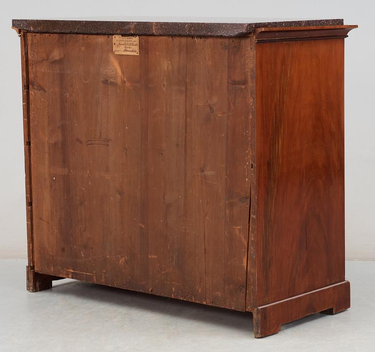 A Swedish Empire 19th century writing commode with porphyry top.