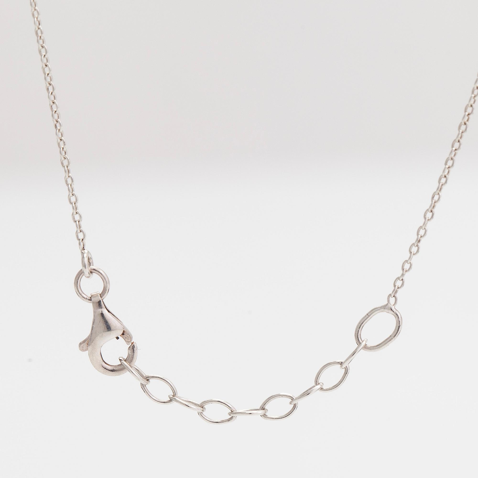 Tiffany & Co, A sterlingsilver pendant with chain.