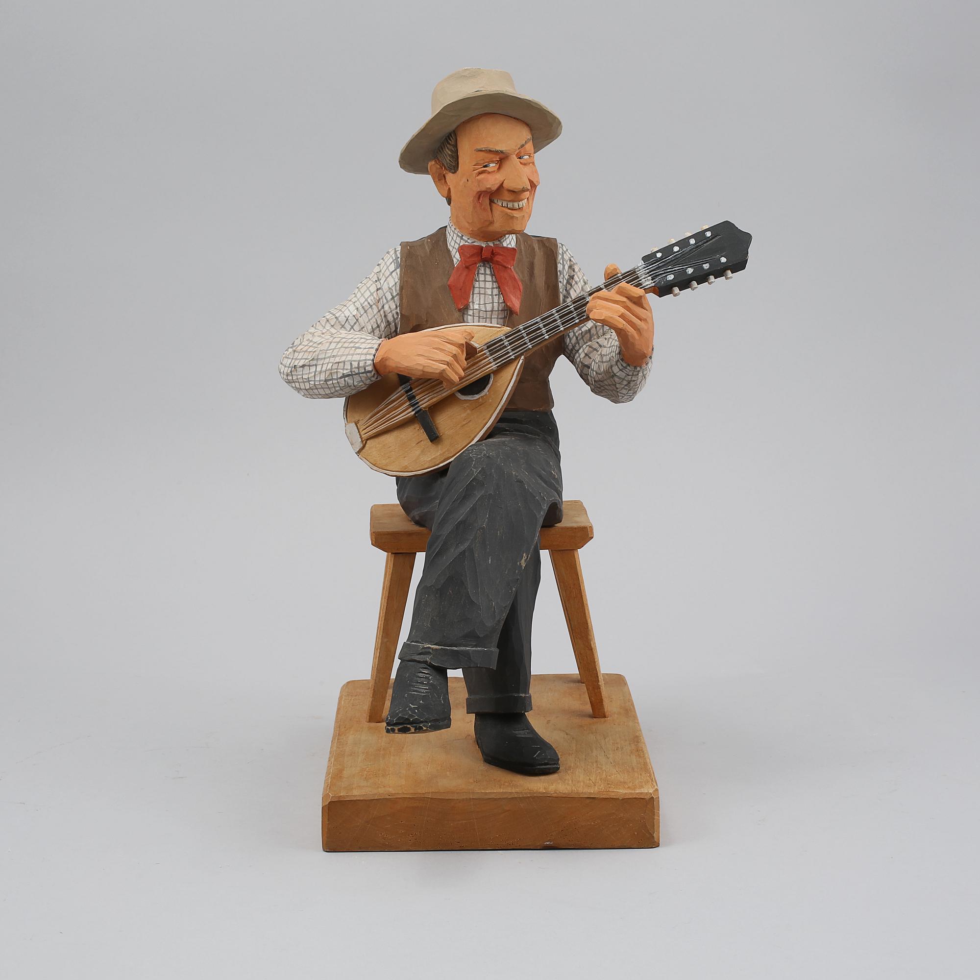 HERMAN ROSELL, träfigur, signerad och daterad 1949.