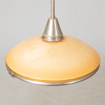 Otto Müller, Taklampa, "Sistrah-pendel", Megaphos, 1900-talets första hälft.