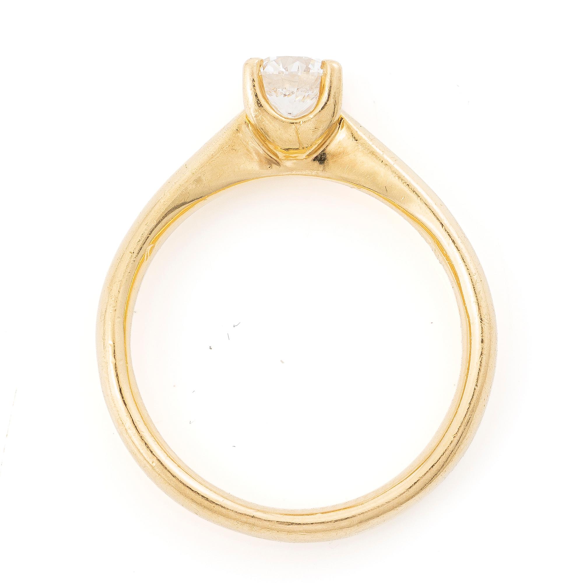 Ring, 18K gold with a brilliant-cut diamond.