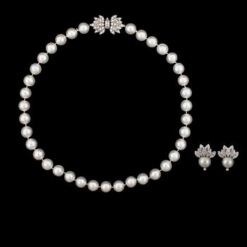 A cultured pearl necklace and earrings with diamonds. Pearls Ø 10 mm. Total carat weight of diamonds circa 1.20 cts.