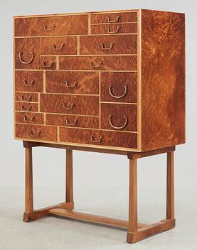 A Josef Frank burrwood veneer, mahogany and walnut cabinet, 'Nationalmuseiskåpet', Svenskt Tenn, model 881.