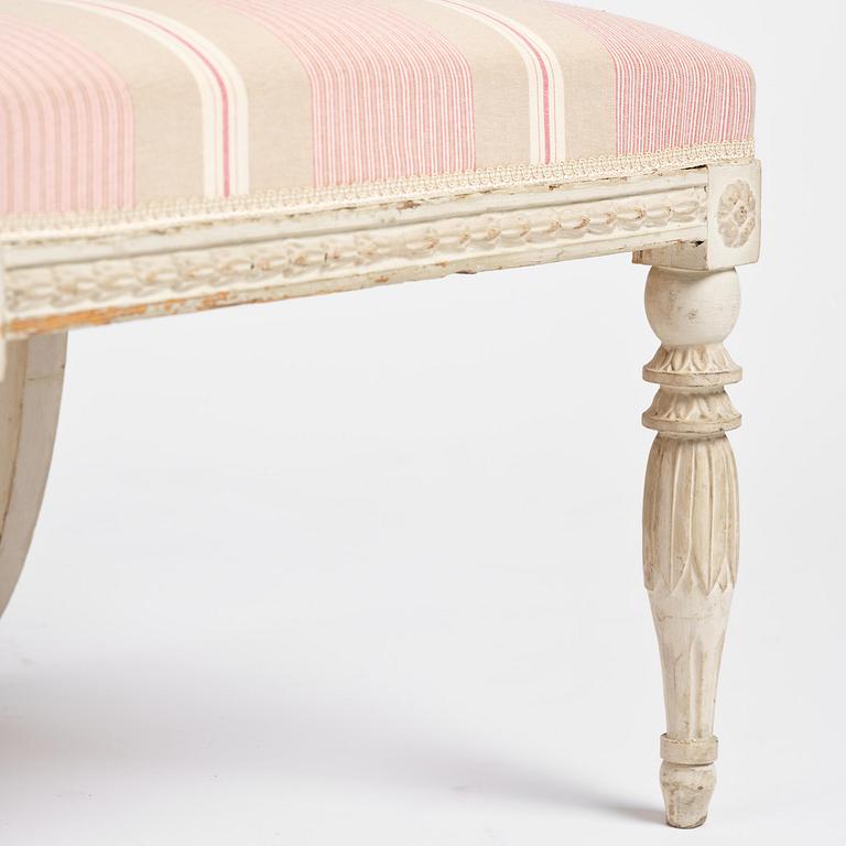 A pair of late Gustavian open.back armchairs, Stockholm, late 18th century.