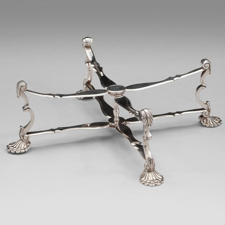 An English 18th century silver dish-cross, marked Robert Tyroll, London 1744.