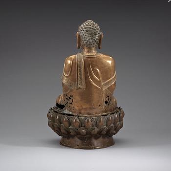 A polished bronze buddha, Ming dynasty (1368-1644).