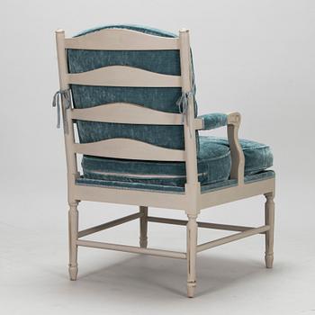 A Gustavian style armchair from the latter half of the 20th century.