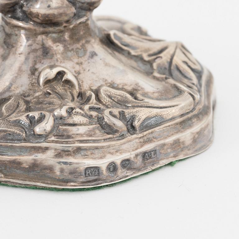 Two pairs of Swedish silver candlesticks, mark of A Lundqvist, Stockholm 1847 and JW Laurén, Stockholm 1854.