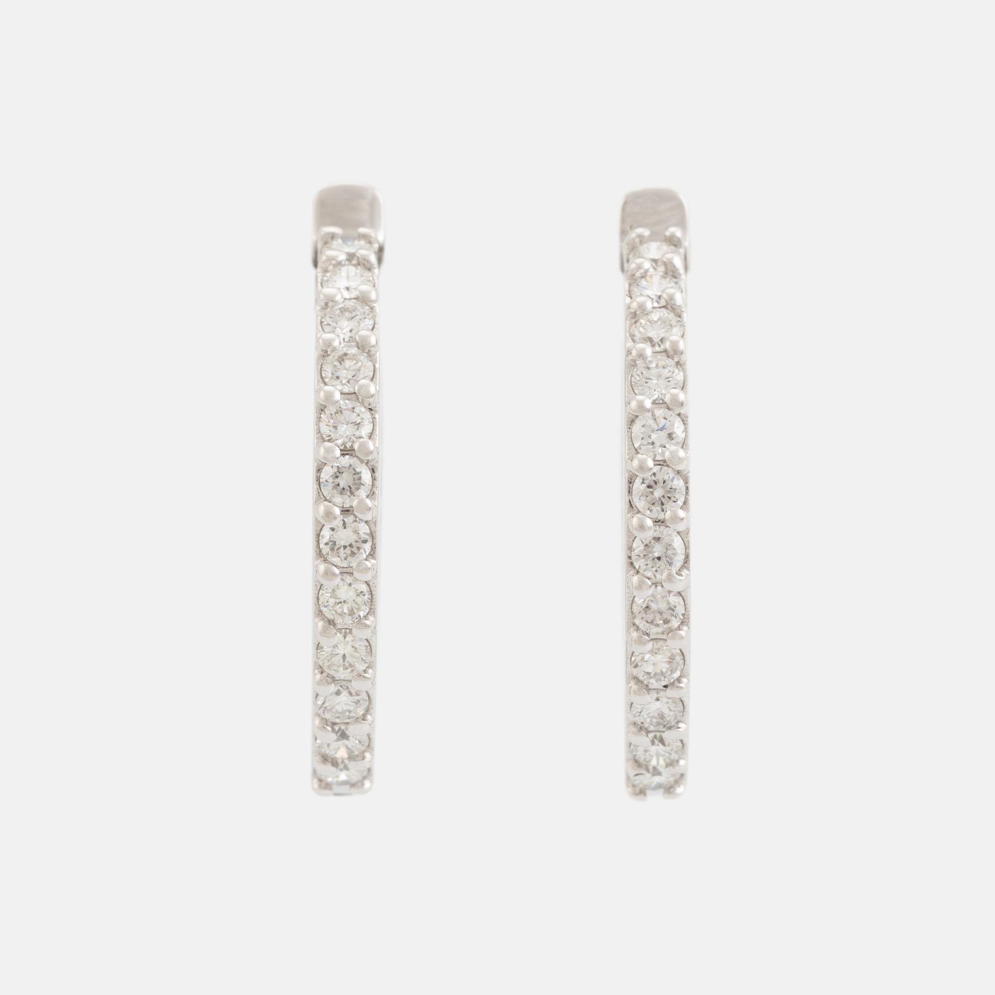 Brilliant cut diamond hoop earrings.