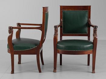 A pair of French Empire early 19th century armchairs.