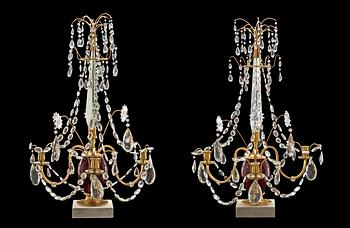 1259. A pair of gilt bronze and glass three-light girandoles, Russia circa 1800.
