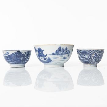 A Chinese blue and white jug, an ewer and three cups, Qing dynasty, Qianlong (1736-95).