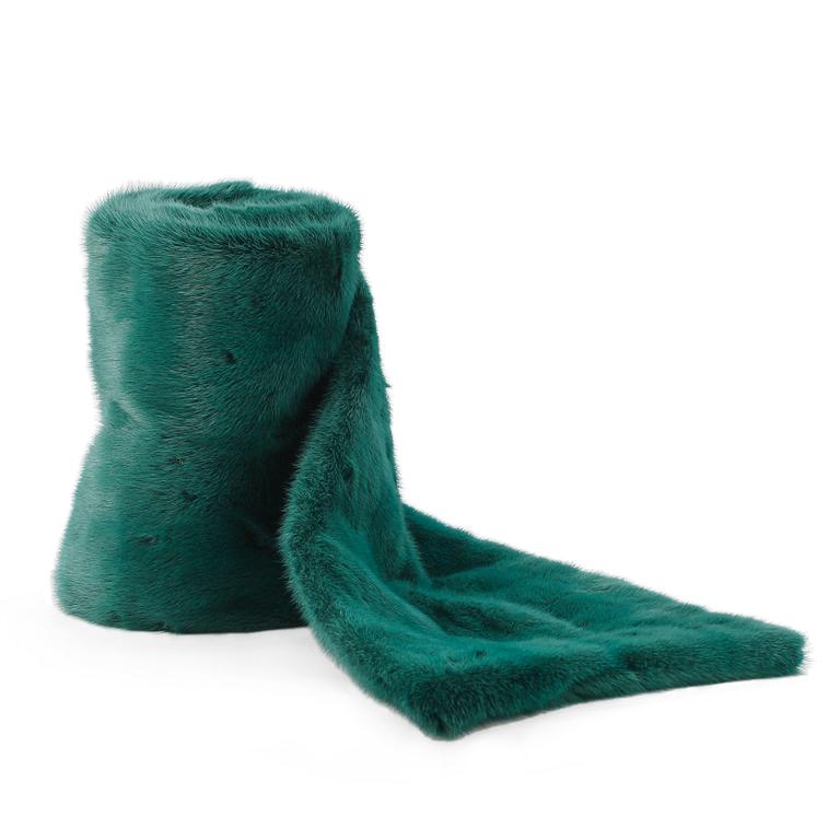 BVLGARI, a green mink stole.