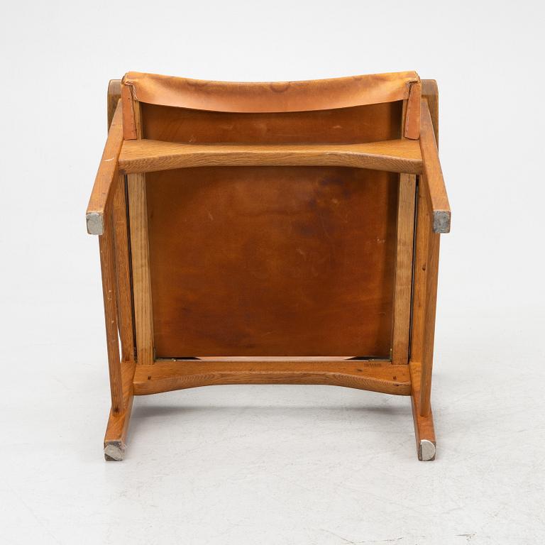 Carl Malmström & Yngve Ekström, a pair of 'Caryngo' oak armchairs, Swedese, second half of the 20th century.