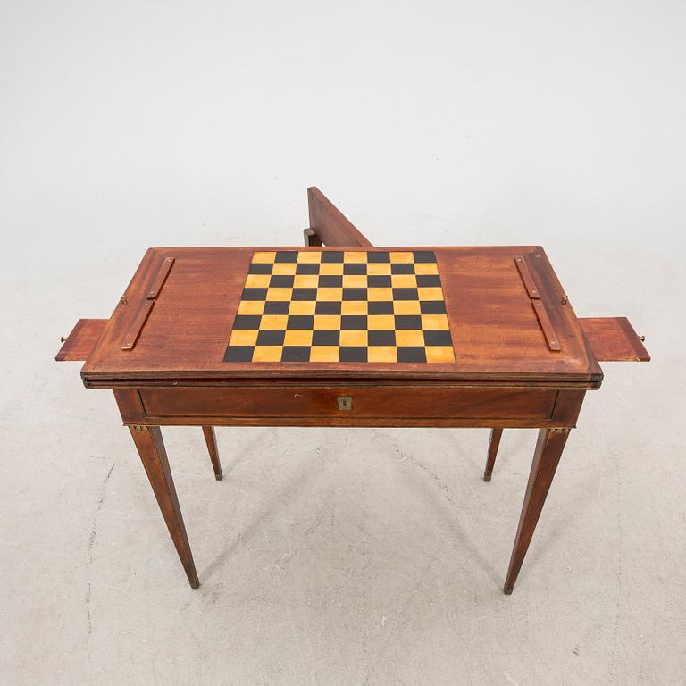A late Gustavian mahogany game table first half of the 19th century.