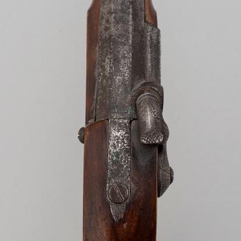 A mid 19th century percussion pistol.