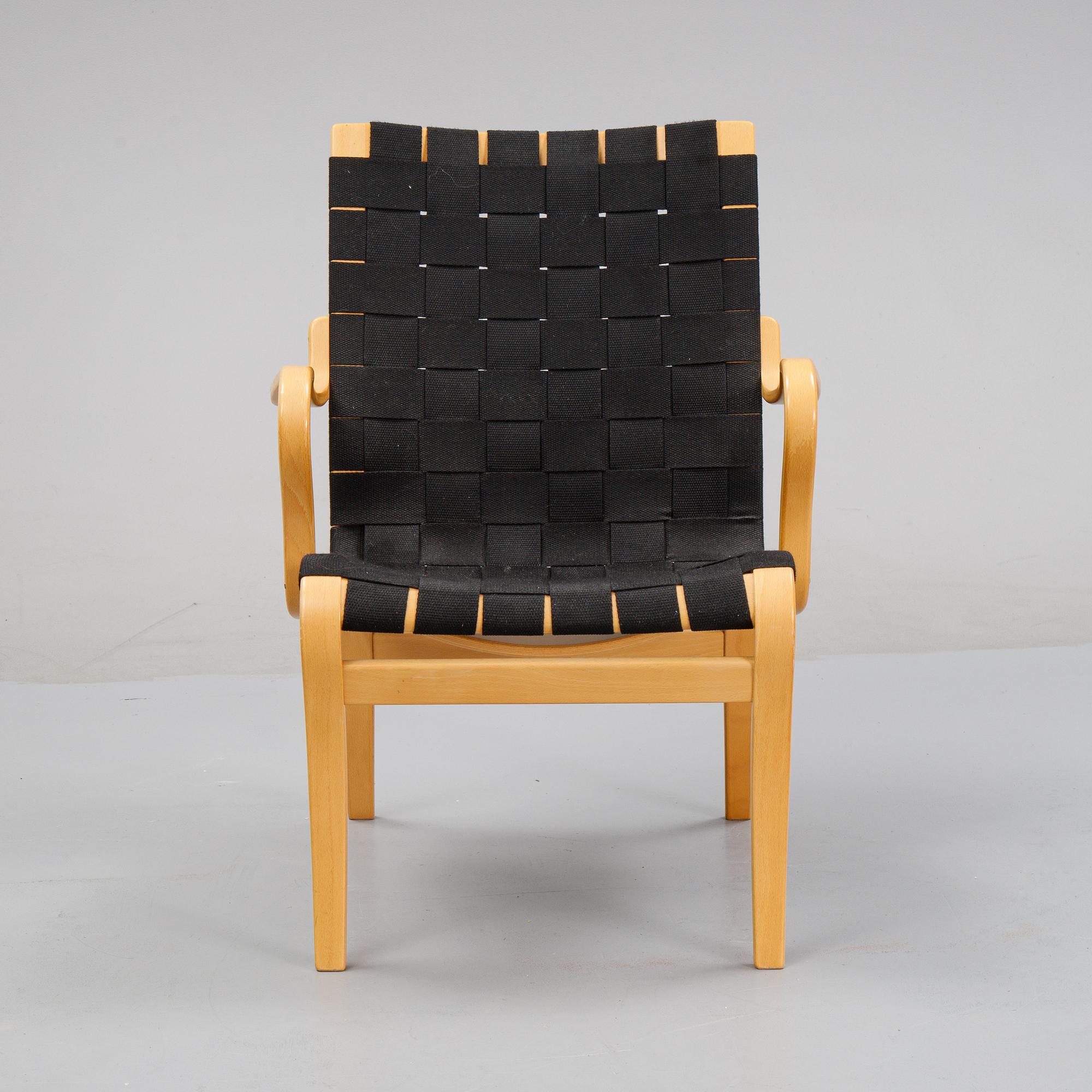 A 'Mina' armchair by Bruno Mathsson for Mathsson International.