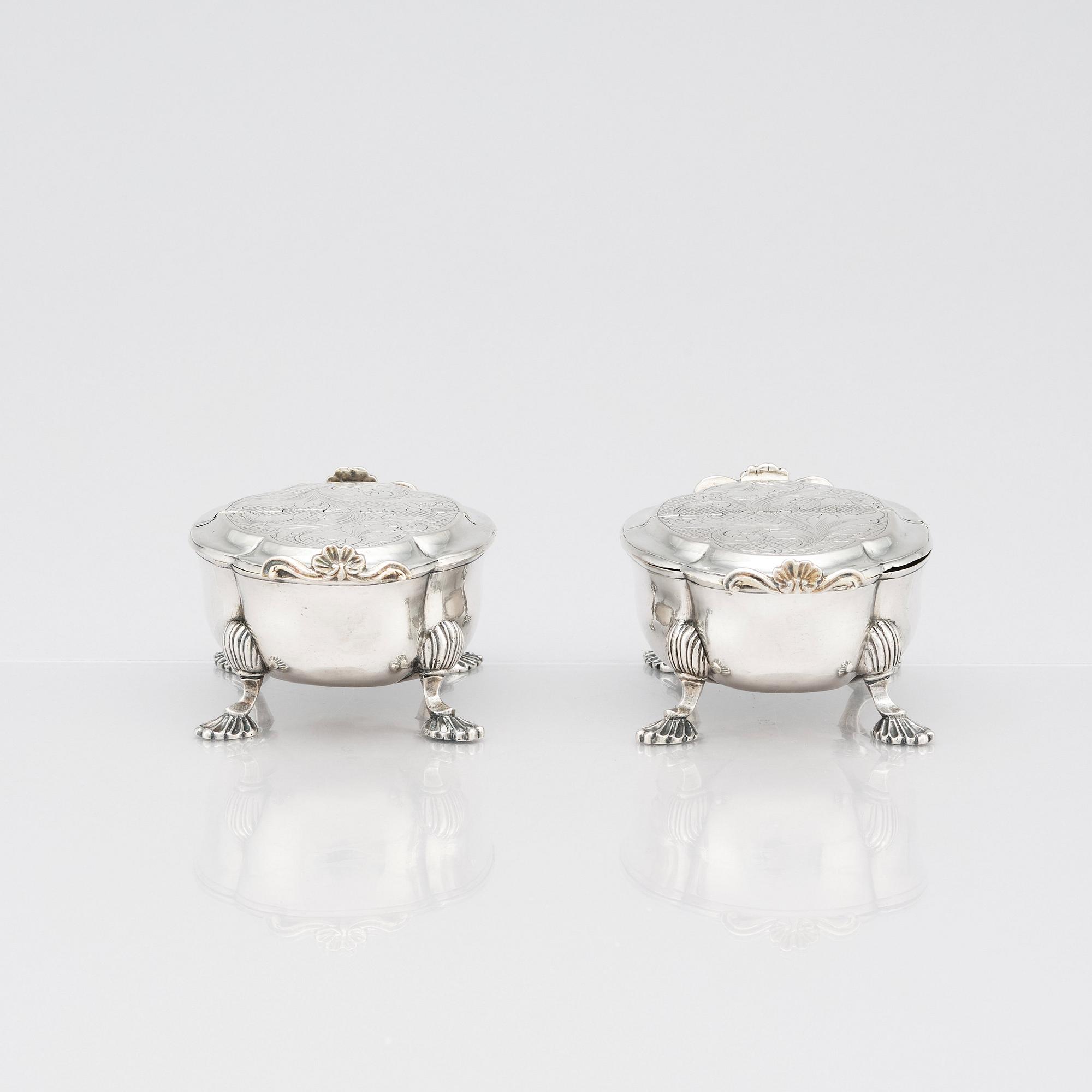 A pair of Latvian Rococo silver salt and pepper stands, marks of Johan Christian Henck (Henke), Riga 1768-80.