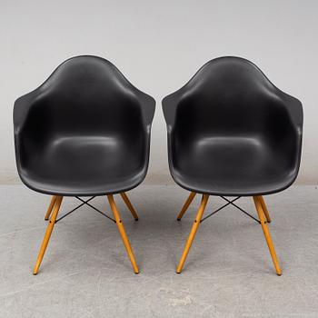 CHARLES & RAY EAMES, a pair of 'DAW' armchairs, Vitra, 2017.