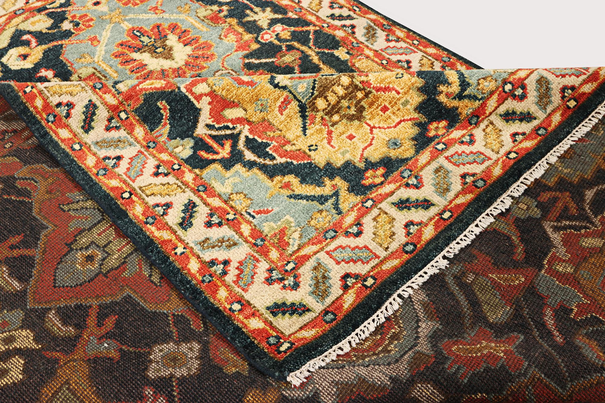 An oriental carpet with Mamluk design, a. 331 x 274 cm.