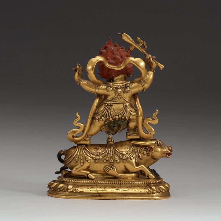 A Sinotibetan gilt bronze and lacquered figure of Yama, Qing dynasty, presumably 18th Century.